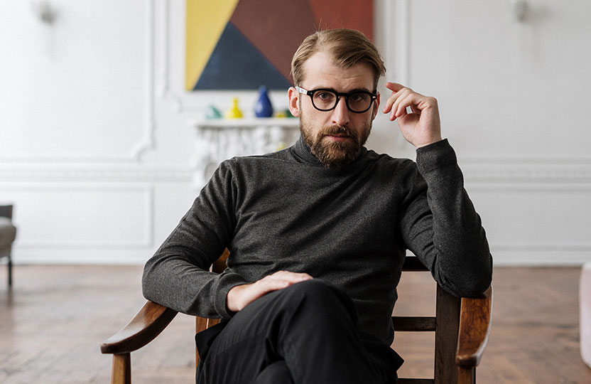 Man Sitting on Chair Man Sitting on Chair